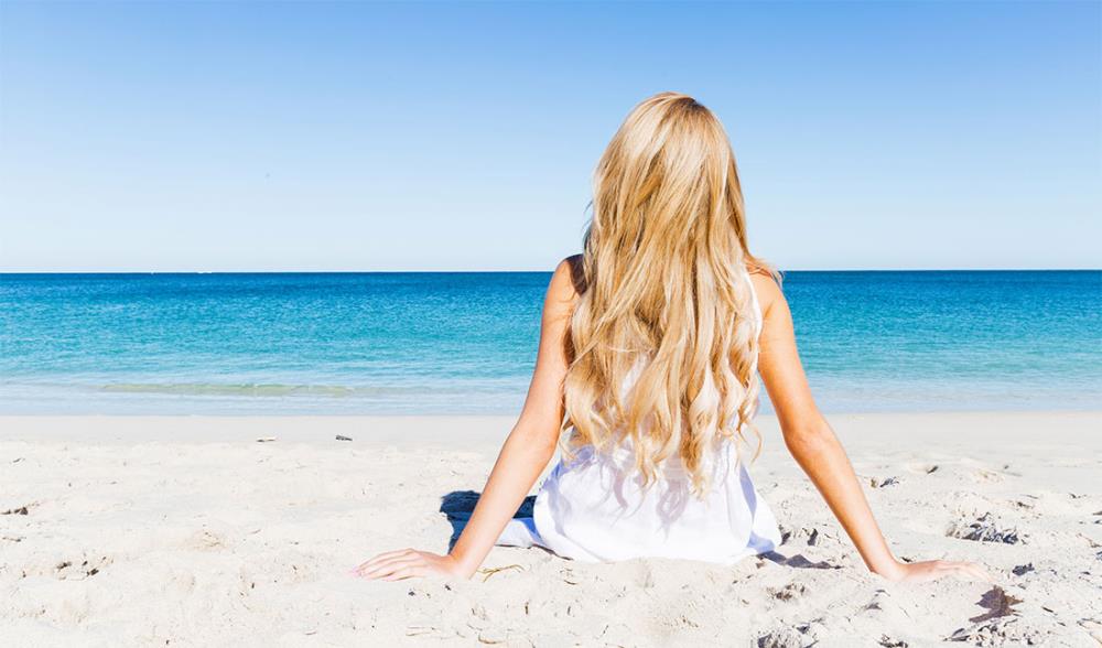 Come proteggere i capelli al mare? Consigli e prodotti da usare